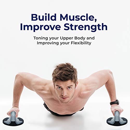 Male athlete using push up bars for strength training